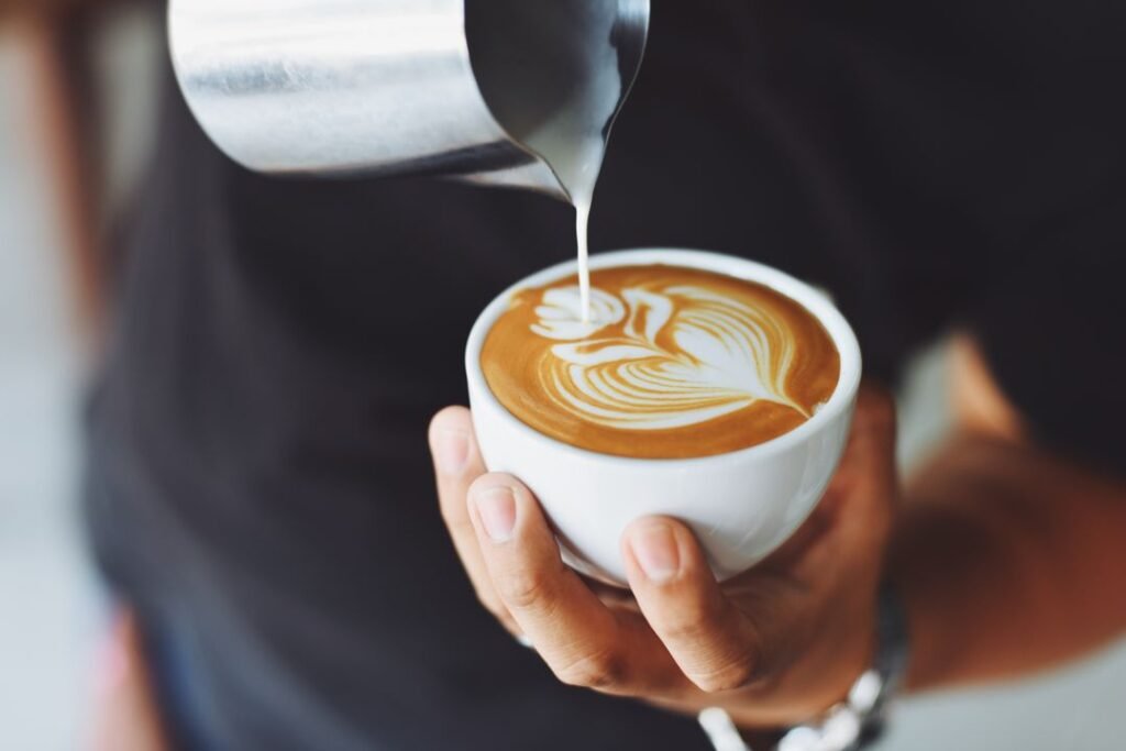 Freshly brewed coffee being poured in a modern home kitchen setting