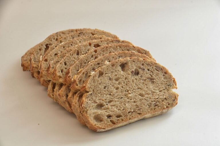 Sliced seeded wheat bread loaf